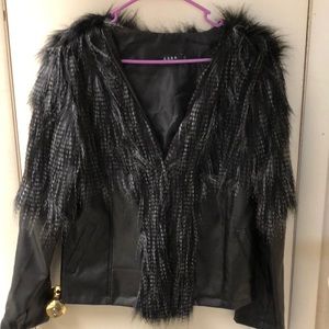 Bolero style jacket trimmed in faux fur